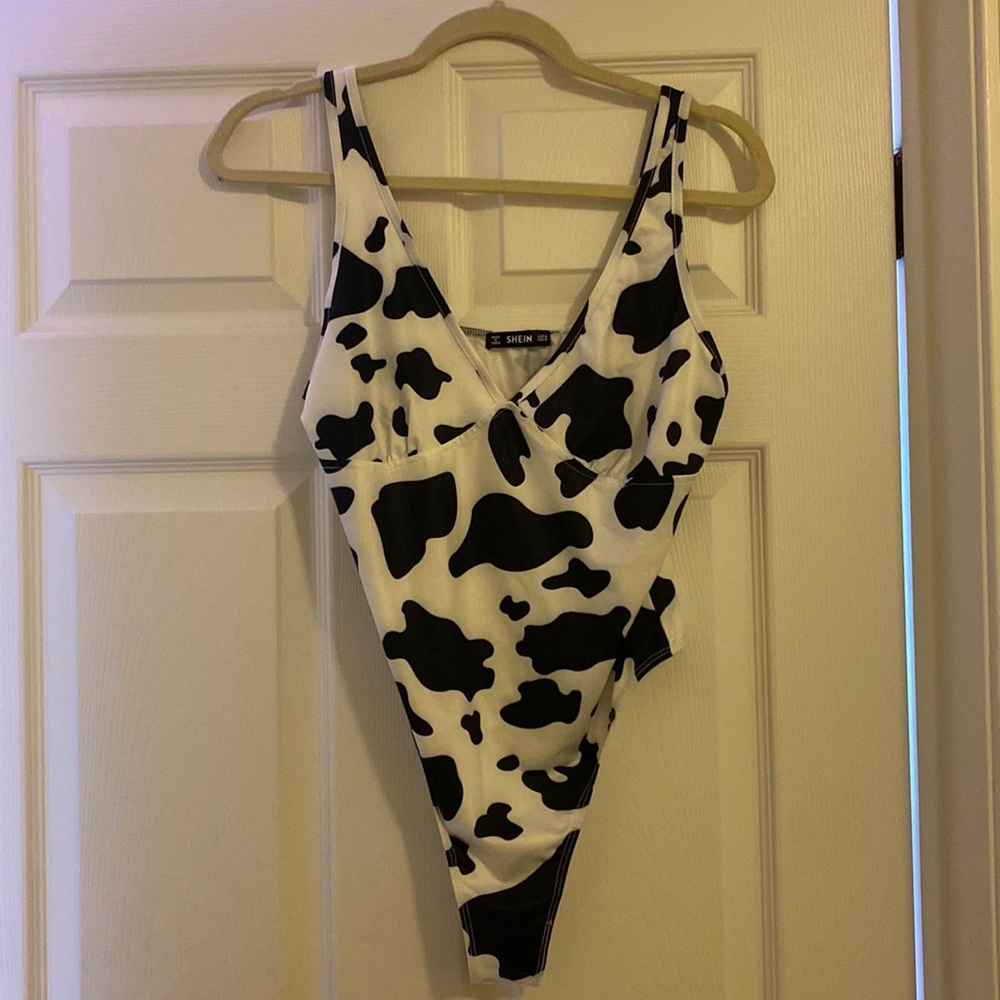 Cow print bodysuit.